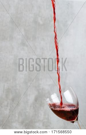 Pouring Red Wine Into A Glass