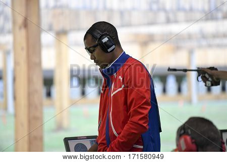 Rio Brazil - august 10 2016: GRAU POTRILLE Jorge (CUB) during shooting 50m Pistol Men Shooting at Olympic Games 2016 in Olympic Shooting Centre Deodoro