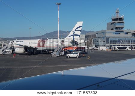 Thessaloniki, Greece - September 23 2016: Aegean airlines aircraft at airport.
Aegean Airlines Airbus A320 parked on the runway of Thessaloniki International Airport Macedonia. Shot inside aircraft.