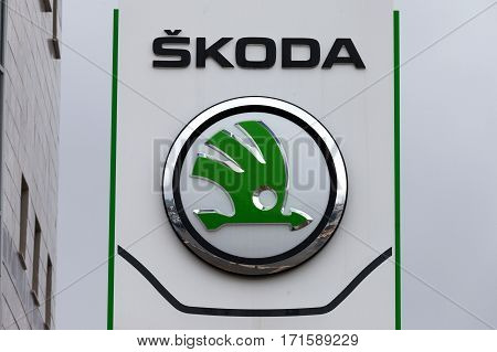 Rome, Italy - February 16, 2017: Skoda emblem at one of Skoda's auto dealerships, Skoda became a wholly owned subsidiary of the Volkswagen Group in 2000