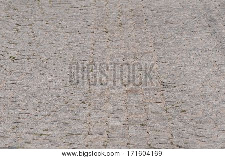 Paving old greey stone surface background - street