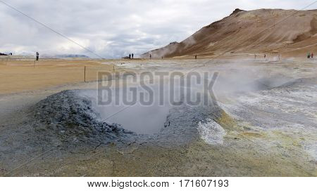 A steaming fumarole on the  geo-thermal heated Krafla Landscape in Iceland