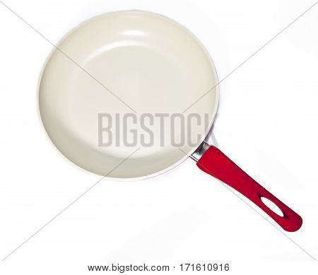 red frying pan on a white background
