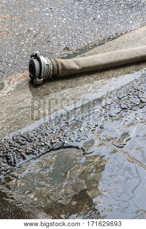 The Fire Hose With Finnish Coupler On Wet Road