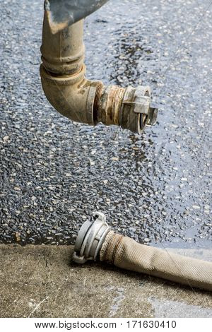 The Fire Hose With Finnish Coupler On Wet Road