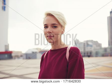 Close up portrait of attractive female tourist 