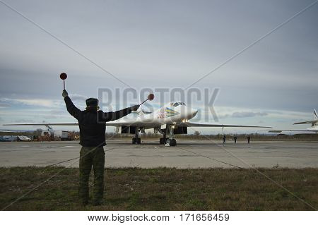 Engels, Saratov Region, Russia - November 08,2012:  Routine busy day at the airbase. Flying of Tu-160 (a supersonic, variable-sweep wing heavy strategic bomber designed by the Tupolev Design Bureau in the Soviet Union)