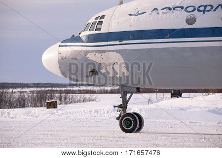 Severomorsk, Murmansk Region, Russia - February 28, 2012: Routine busy day at the airbase. Flying of  Il-20rt (is a large turboprop airliner that first flew in 1957 and became one of the best known and durable Soviet aircraft of its era. )