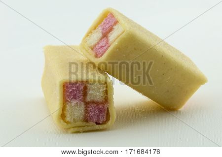 Two Battenberg cake on a white background