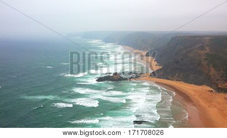 Beaches Clifs And Fog Along Ocean Coast