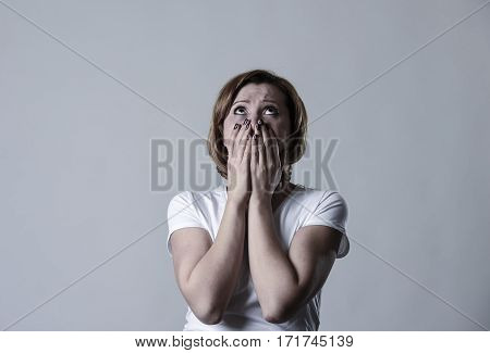 young devastated depressed woman crying sad feeling hurt suffering depression in sadness emotion gesturing helpless in pain face expression isolated background desperate
