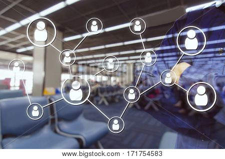 Double exposure of man and cross one's arm and icon social media connection concept with airport blurred background, color tone effect.