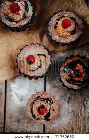 Delicious Chocolate Cupcakes With Berries On Wodeen Table, Top V