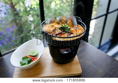 hot Creamy mussel hot soup spicy taste.