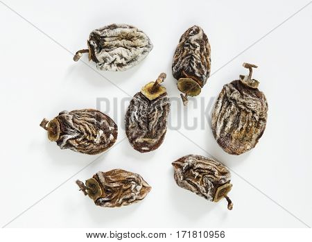 Dried persimmon on a white background