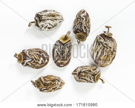 Dried persimmon on a white background