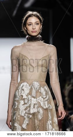 New York NY USA - February 15 2017: Cristina Piccone walks runway for the Dennis Basso FW17 collection runway show during New York Fashion Week at Skylight Clarkson Sq. Manhattan