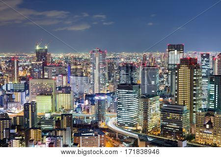 Osaka city business downtown with twiligh sky background Japan