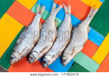 Dried Fish Hanging On A Thread
