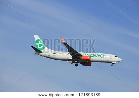 Amsterdam the Netherlands - July 21st 2016: PH-GUY Transavia Boeing 737 approaching Polderbaan runway at Schiphol Amsterdam Airport arriving from Malaga