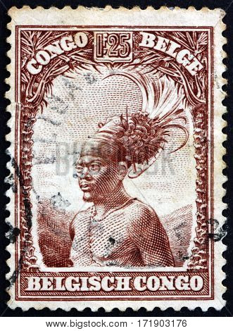 BELGIAN CONGO - CIRCA 1931: a stamp printed in Belgian Congo shows Mangbetu chief circa 1931