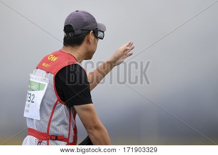 Rio Brazil - august 10 2016: HU Binyuan (CHN) during Double Trap Men at Olympic Games 2016 in Olympic Shooting Centre Deodoro