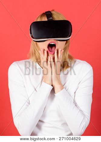 Woman Wearing Virtual Reality Goggles. Confident Young Woman Adjusting Her Virtual Reality Headset A