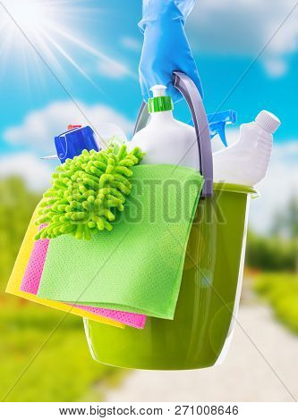 Cleaning Concept Of Cleaning Supplies Needed To Spring Cleaning. Cleaning Equipment At Spring Backgr