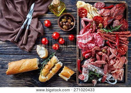Set Of Meat Appetizer - Jamon, Chistorra, Chorizo, Salchichon, Fuet, Olives, Tomatoes, Chili Peppers