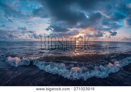 A Beautiful Sunset Sky Over The Sea.