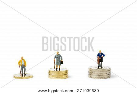Small Figurines And Stacks Of Euro Coins On Bright Background. Economic Inequality By Gender. Inequa