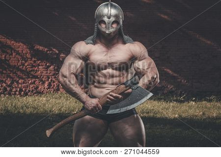 Outdoor Sport Brutal Strong Muscular Men With Sword
