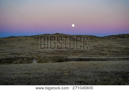 Sunset With Moon And Moonrise On The High Desert Plains Of Eastern Montana, Near Miles City, Mt.