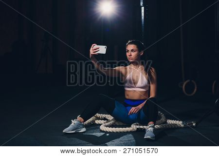Sport Woman Smile At Camera Self Picture At Gym, Young Girl Picture Herself Exercising Fitness Cente
