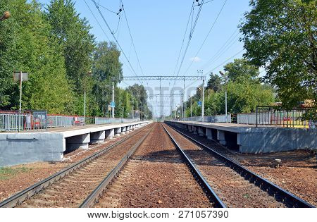 Suburban Station On The Double-track Railway On A Sunny Day
