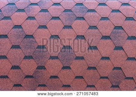 Red Roofing Made Of Soft Shingles. Roof Covering.
