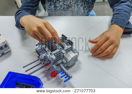Vilnius, Lithuania - November 23, 2018: Kid Making Lego Robot Mindstorms. Robotic, Learning, Technol