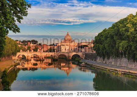 Saint Peter Cathedral And Saint Angel Bridge Over The Tiber River In The Morning In Rome, Italy.