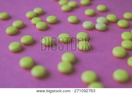 Small Yellow Orange Beautiful Medical Pharmaceptic Round Pills, Vitamins, Drugs, Antibiotics On A Pi