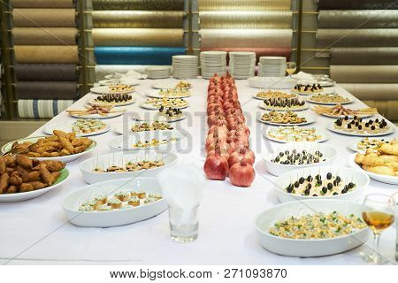 Party Event Buffet Table With Assortment Of Canapes And Pomegran