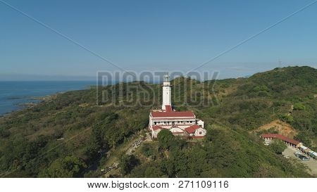 Aerial View Of Lighthouse On Hill. Cape Bojeador Lighthouse, Burgos, Ilocos Norte, Philippines.