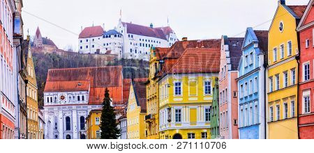 Beautiful places of Germany- Landshut town in Bavaria. View with traditional colorful houses and castle Trausnitz