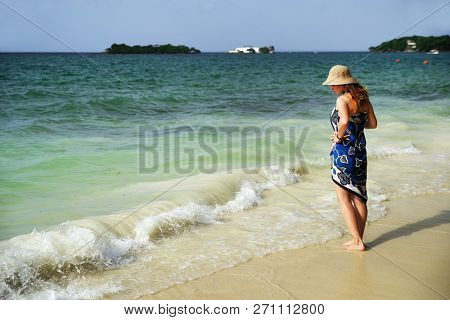 Young girl enjoying the carribean landscape, Colombia, South America