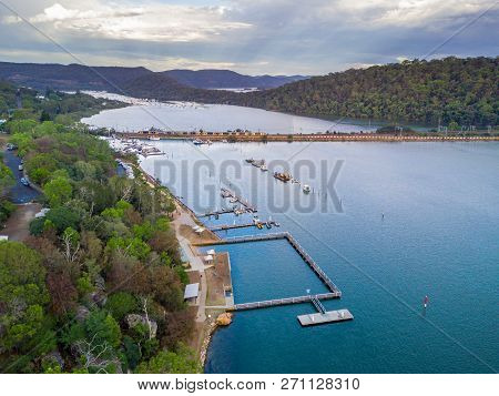 A Passenger Train Takes Commuters To Work Crossing The Hawkesbury River At Brooklyn. In For The Fore