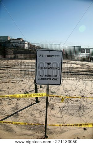 San Ysidro, California 11/26/2018: US Government Warning signs. Warning signs and Caution Tape from government agencies regarding the US/Mexico border.