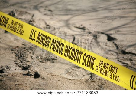San Ysidro, California 11/26/2018: US Government Warning signs. Warning signs and Caution Tape from government agencies regarding the US/Mexico border.