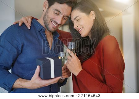  Couple inlove exchanging gifts for Valentin'es Day                              