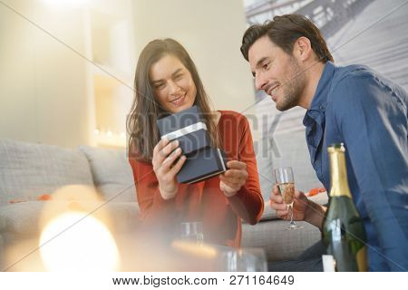  Couple inlove exchanging gifts for Valentin'es Day                              