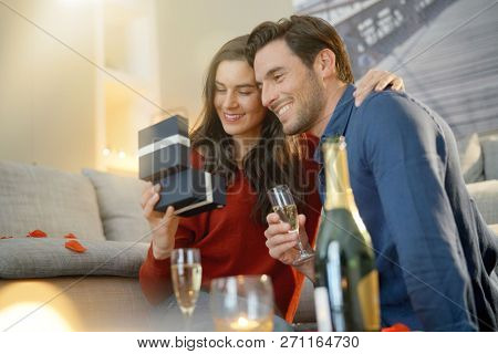  Couple inlove exchanging gifts for Valentin'es Day                              