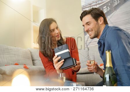  Couple inlove exchanging gifts for Valentin'es Day                              